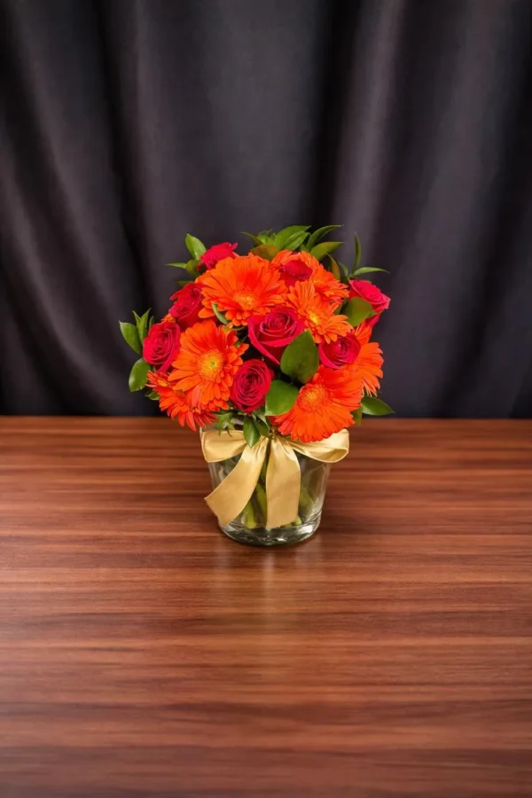 WhatsApp Image 2026-02-18 at 11.44.05 PM (1) Fusión carmesí (10 rosas y 10 gerberas)