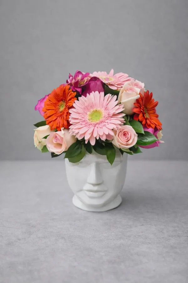 Fiesta floral (6 gerberas y 15 rosas)