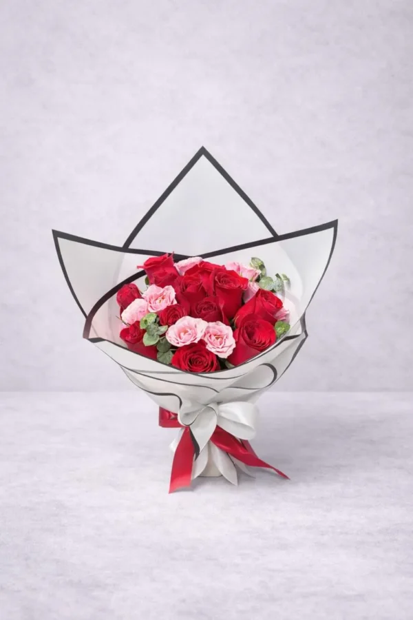 WhatsApp Image 2026-03-04 at 12.56.33 PM (1) Pasión y amor (12 rosas y 5 mini rosas)