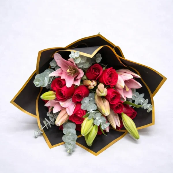 WhatsApp Image 2026-03-06 at 8.32.11 AM Ramo de Lilis rosas y rosas rojas