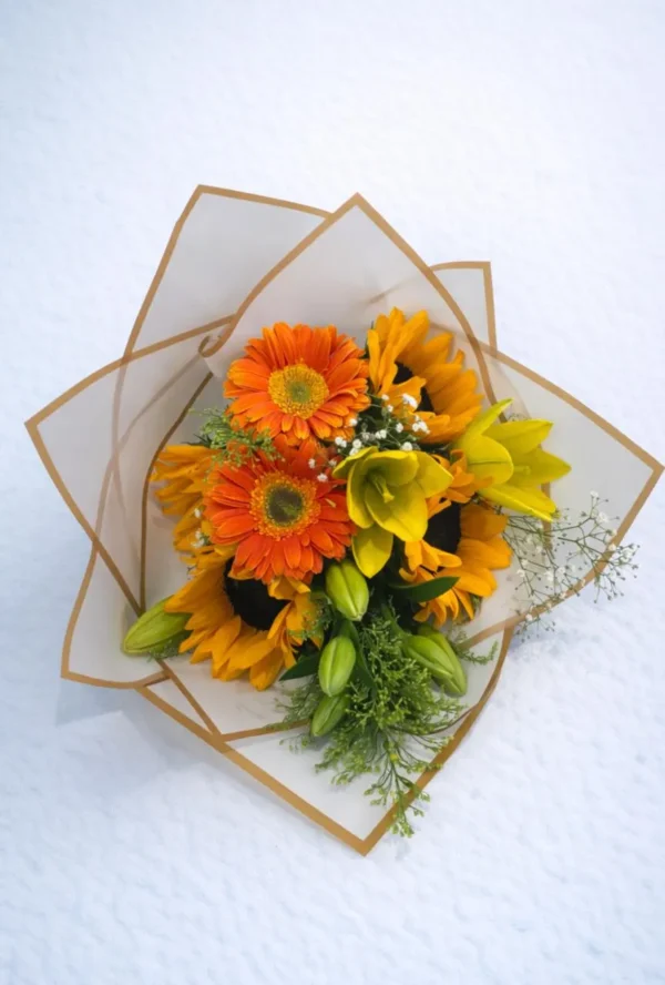 WhatsApp Image 2026-03-19 at 12.00.15 PM Ramo de lilis amarilla y girasoles