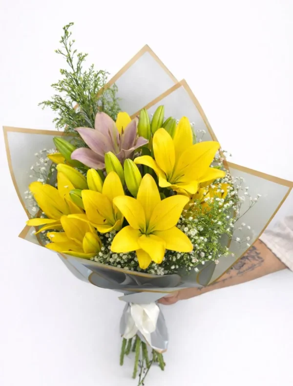 WhatsApp Image 2026-03-19 at 12.24.52 PM Ramo de 9 lilis amarillas y 1 lili rosa